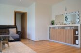 Bestandsfreies Mehrfamilienhaus mit zwei Grundstücken in Feldkirch zu verkaufen - Wonzimmer bearbeitet